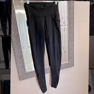 Athleta black leggings with ankle zip
